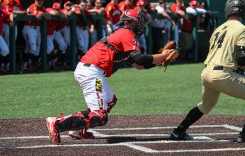 Junior Nick Cieri reaches to tag a Purdue player out 4/24/26 Hannah Evans/Maryland Baseball Network